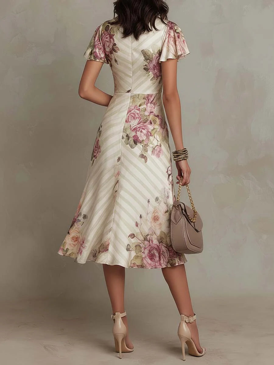 Elegant Ivory Floral Midi Dress for Women with V Neck Flutter Sleeve Wrap Ruched Flowing Style