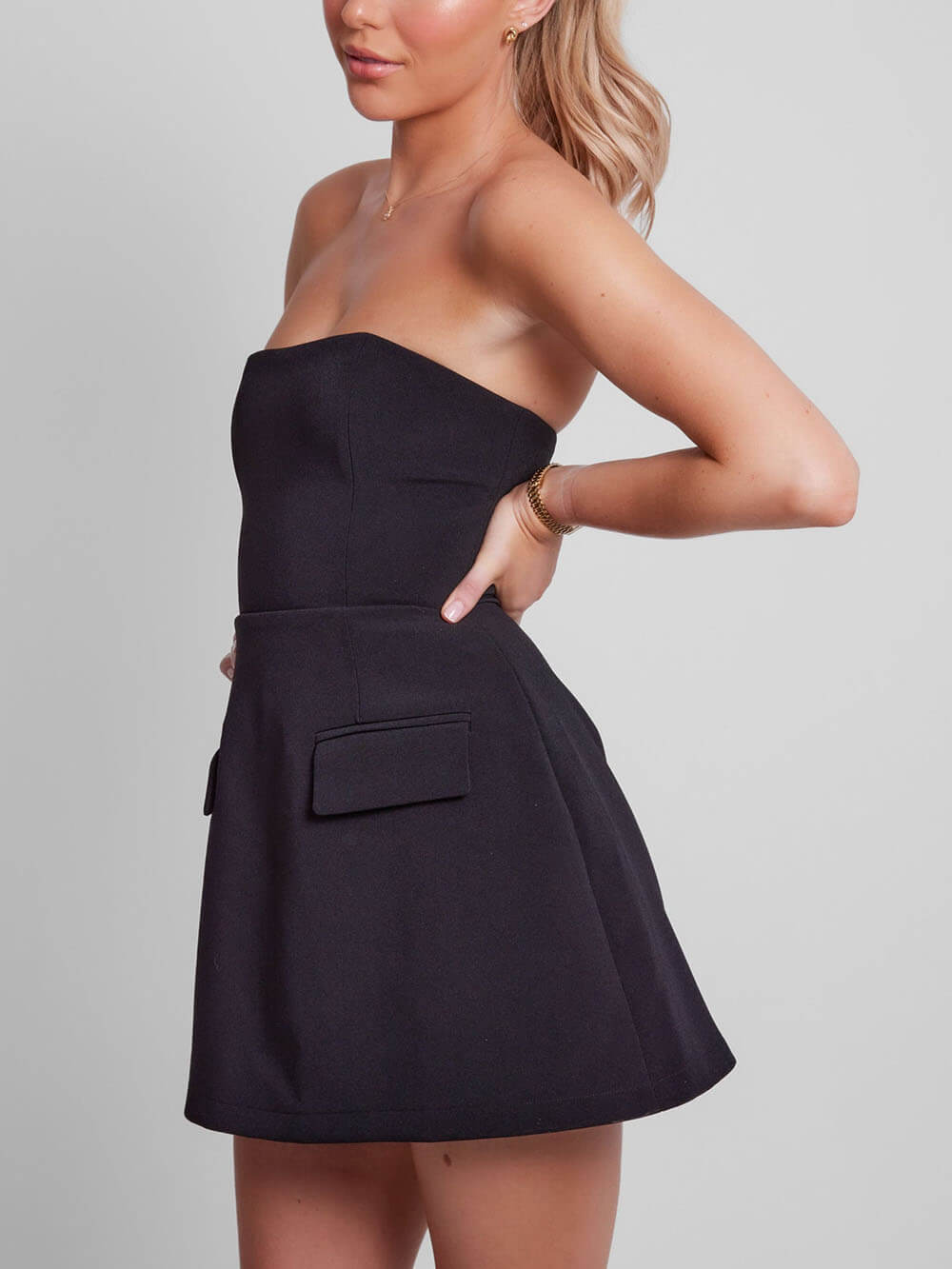 Elegant Tailored Mini Dress for Women with Strapless Flap Pocket Fit and Flare Cocktail Style