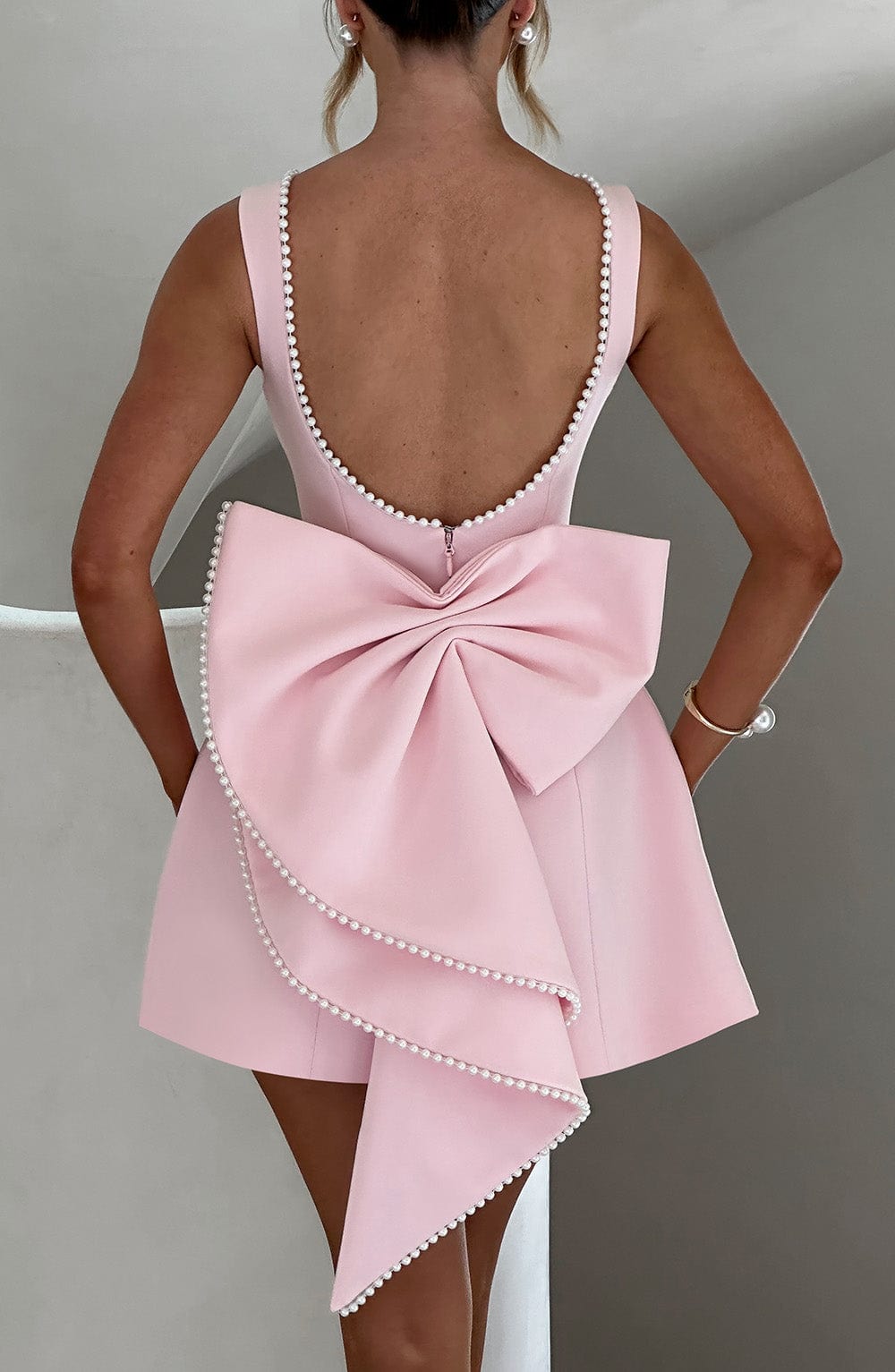 Elegant Pearl Embellished Mini Dress for Women with Boat Neck Sleeveless Bow Back Fit And Flare Cocktail Style