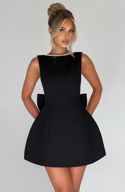 Elegant Pearl Embellished Mini Dress for Women with Boat Neck Sleeveless Bow Back Fit And Flare Cocktail Style
