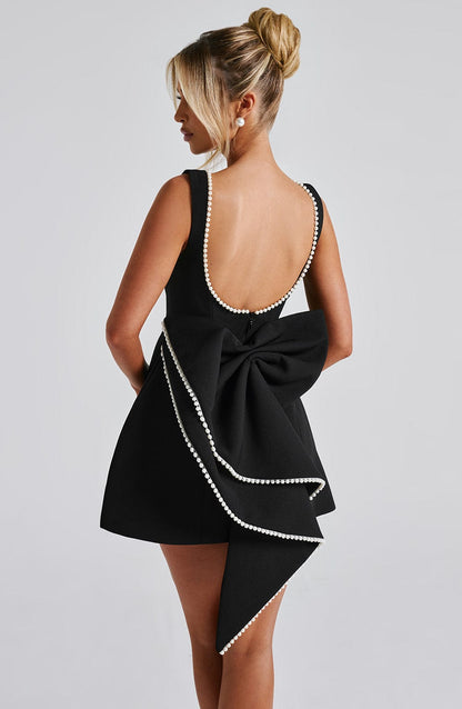 Elegant Pearl Embellished Mini Dress for Women with Boat Neck Sleeveless Bow Back Fit And Flare Cocktail Style