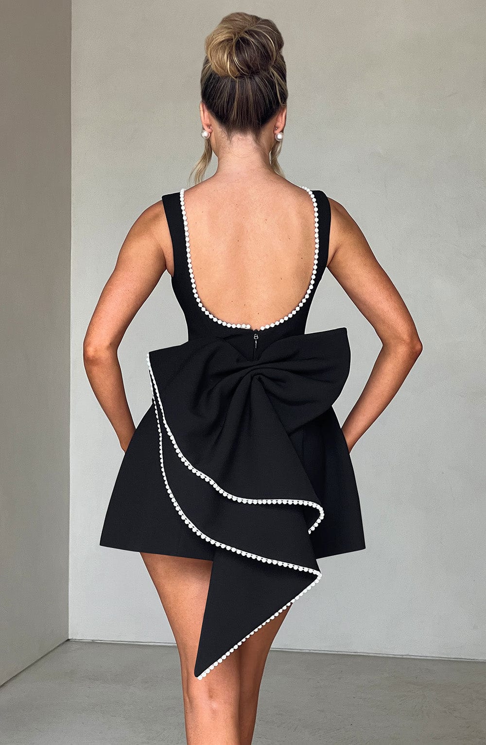 Elegant Pearl Embellished Mini Dress for Women with Boat Neck Sleeveless Bow Back Fit And Flare Cocktail Style