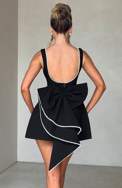 Elegant Pearl Embellished Mini Dress for Women with Boat Neck Sleeveless Bow Back Fit And Flare Cocktail Style
