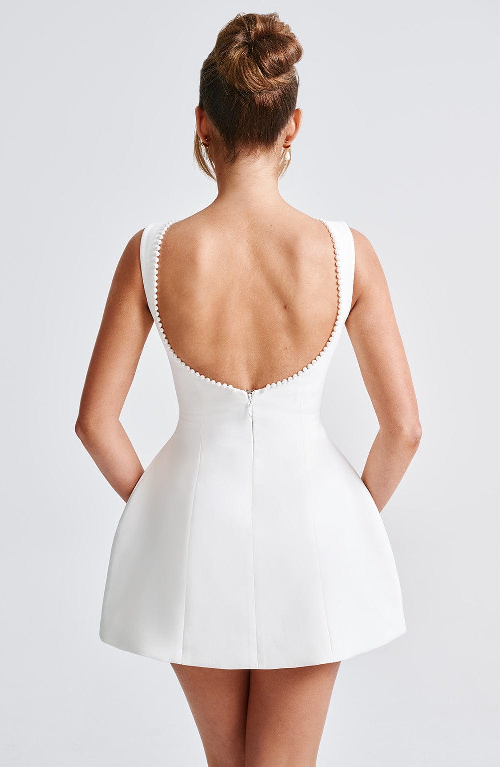 Elegant Pearl Embellished Mini Dress for Women with Boat Neck Sleeveless Bow Back Fit And Flare Cocktail Style