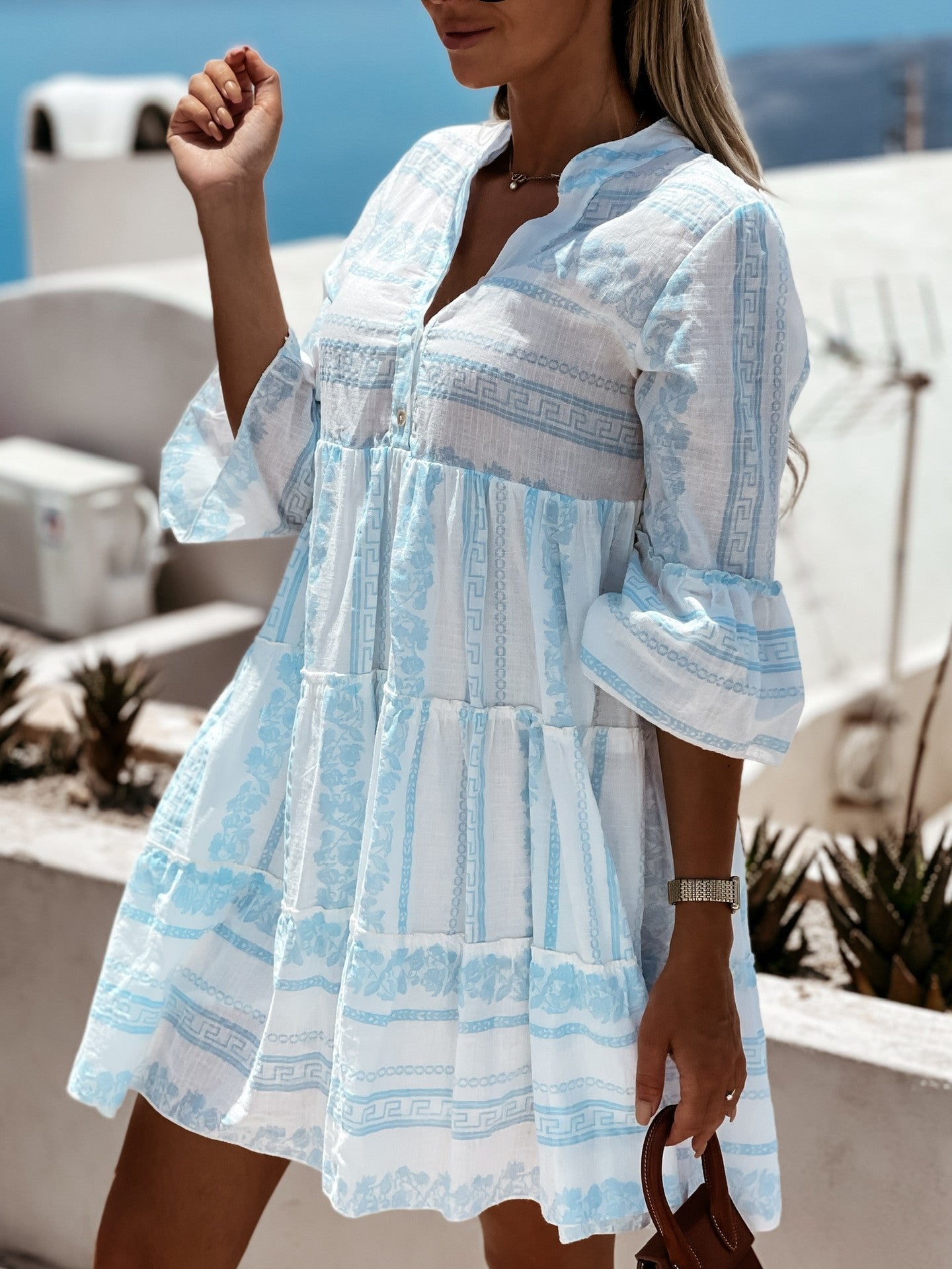 Effortless Printed Tiered Mini Dress for Women with V Neck Bell Sleeve Button Front Bohemian Style