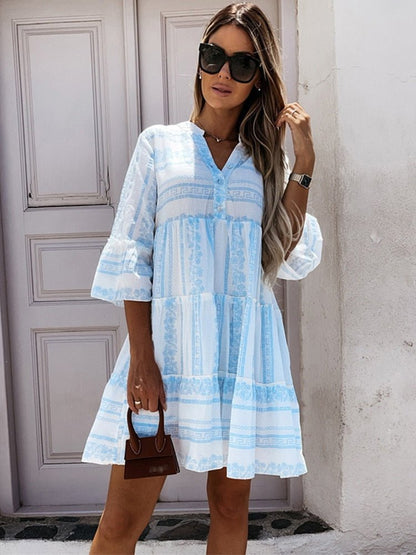 Effortless Printed Tiered Mini Dress for Women with V Neck Bell Sleeve Button Front Bohemian Style