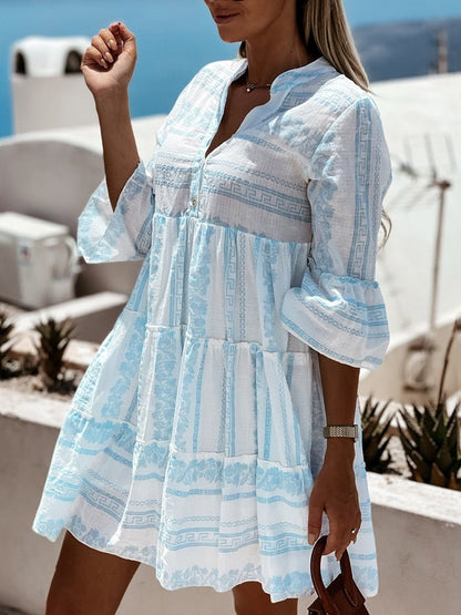 Effortless Printed Tiered Mini Dress for Women with V Neck Bell Sleeve Button Front Bohemian Style